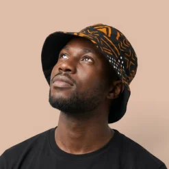 Bucket hat / Vissershoedje met Afrikaanse print - Zwart Oranje Bogolan Symbols - Kinderen & Volwassenen (Unisex)