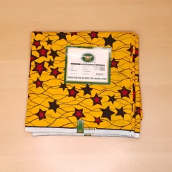 VLISCO stof Hollandais Afrikaanse Wax print - Geel / Rode Stars