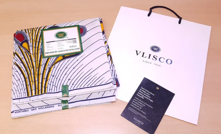 VLISCO stof Hollandais Afrikaanse Wax print - Wit / Rode Bulb