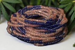 Waist Beads / Afrikaanse Heupketting - OSAYEMWENRE - Blauw / roze (elastisch)
